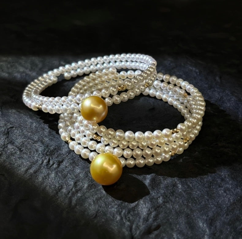 FURINA JEWELRY 18k gold NanYang gold bead freshwater AK pearl bracelet with double rings and multiple layers of natural pearls. Original design.