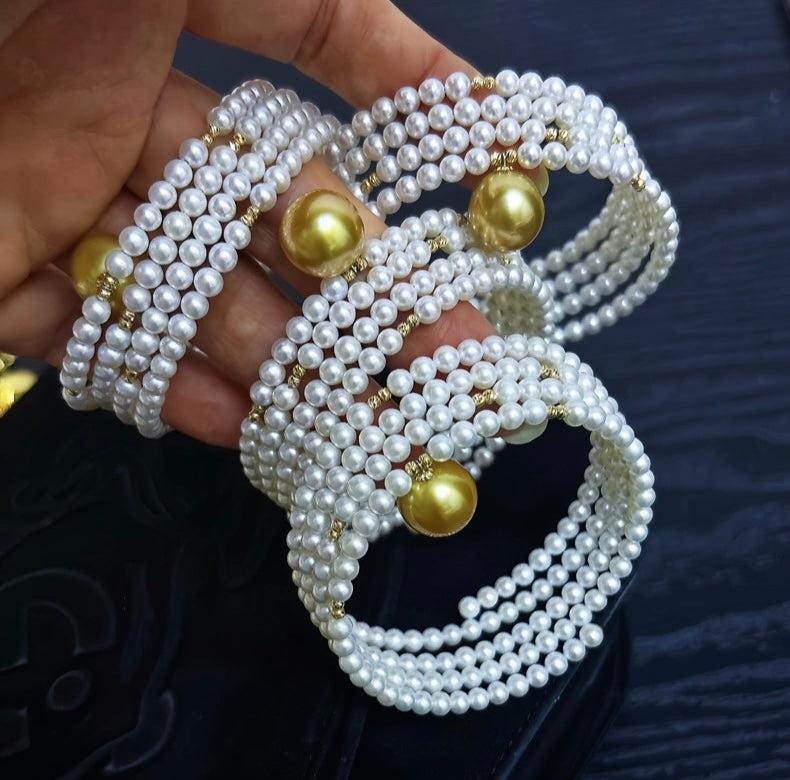 FURINA JEWELRY 18k gold NanYang gold bead freshwater AK pearl bracelet with double rings and multiple layers of natural pearls. Original design.
