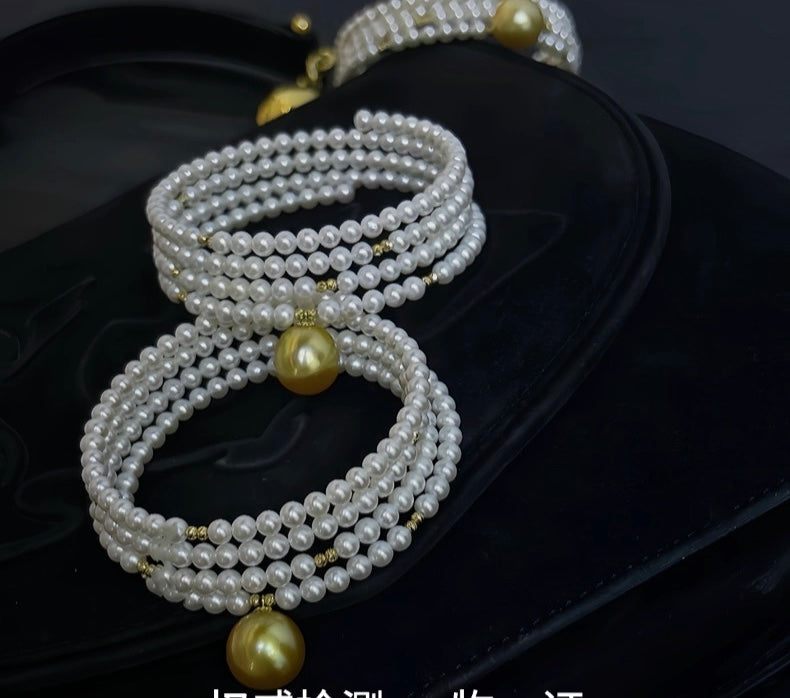 FURINA JEWELRY 18k gold NanYang gold bead freshwater AK pearl bracelet with double rings and multiple layers of natural pearls. Original design.