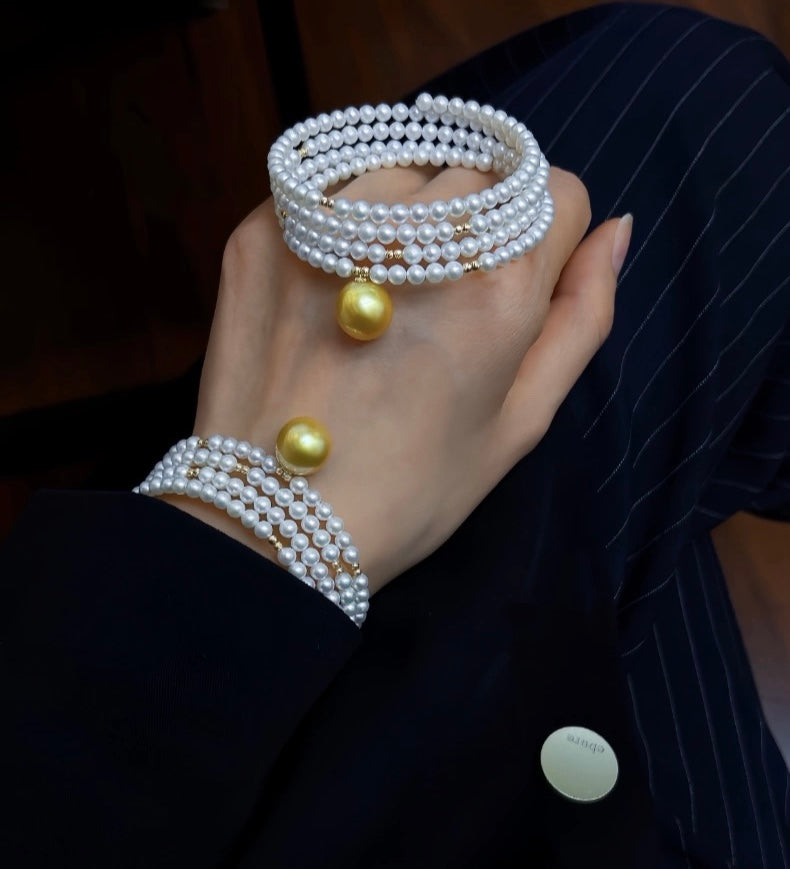 FURINA JEWELRY 18k gold NanYang gold bead freshwater AK pearl bracelet with double rings and multiple layers of natural pearls. Original design.