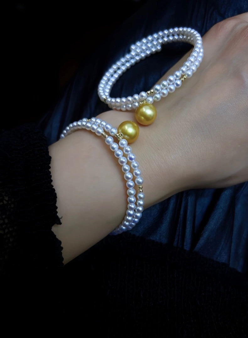 FURINA JEWELRY 18k gold NanYang gold bead freshwater AK pearl bracelet with double rings and multiple layers of natural pearls. Original design.