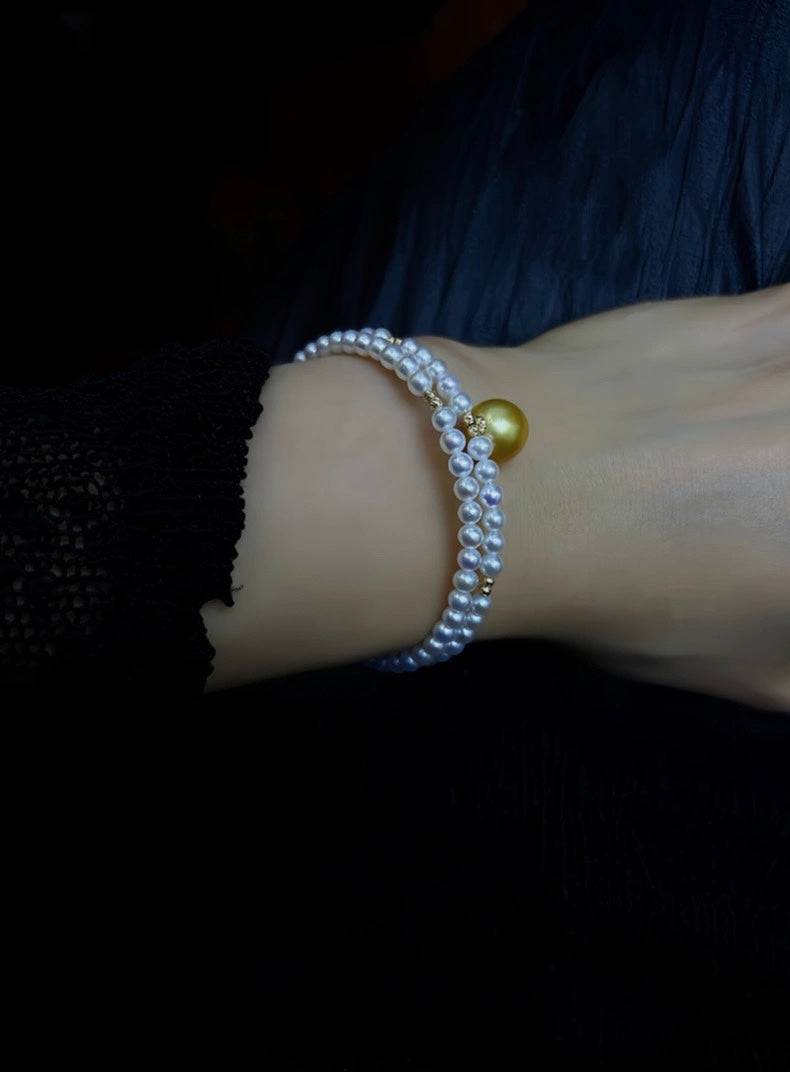 FURINA JEWELRY 18k gold NanYang gold bead freshwater AK pearl bracelet with double rings and multiple layers of natural pearls. Original design.