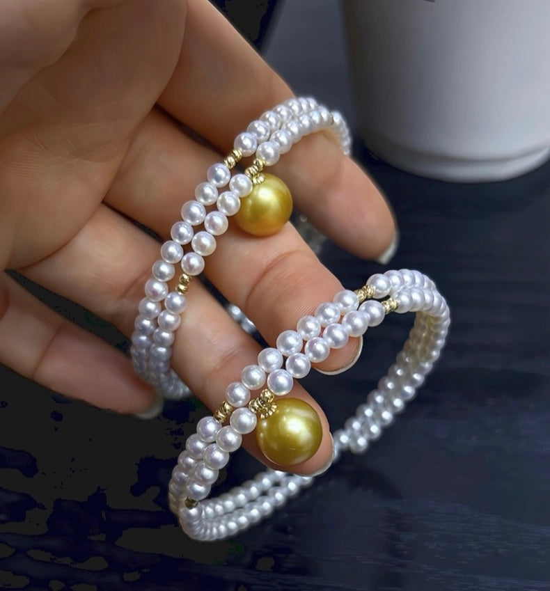 FURINA JEWELRY 18k gold NanYang gold bead freshwater AK pearl bracelet with double rings and multiple layers of natural pearls. Original design.