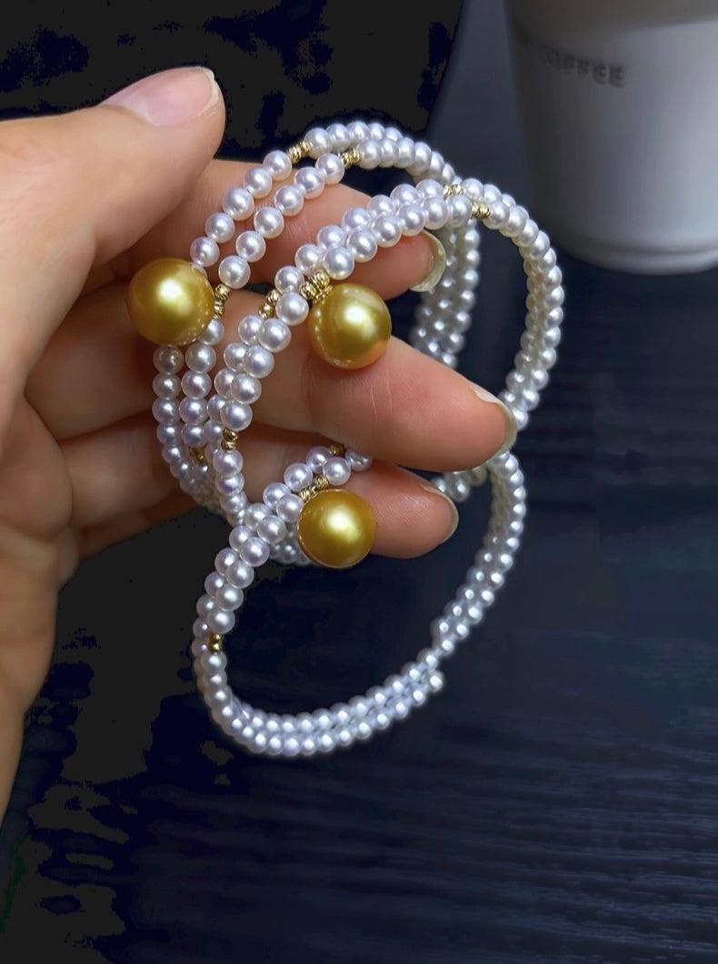 FURINA JEWELRY 18k gold NanYang gold bead freshwater AK pearl bracelet with double rings and multiple layers of natural pearls. Original design.