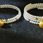 FURINA JEWELRY 18k gold NanYang gold bead freshwater AK pearl bracelet with double rings and multiple layers of natural pearls. Original design.