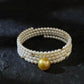 FURINA JEWELRY 18k gold NanYang gold bead freshwater AK pearl bracelet with double rings and multiple layers of natural pearls. Original design.