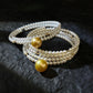 FURINA JEWELRY 18k gold NanYang gold bead freshwater AK pearl bracelet with double rings and multiple layers of natural pearls. Original design.
